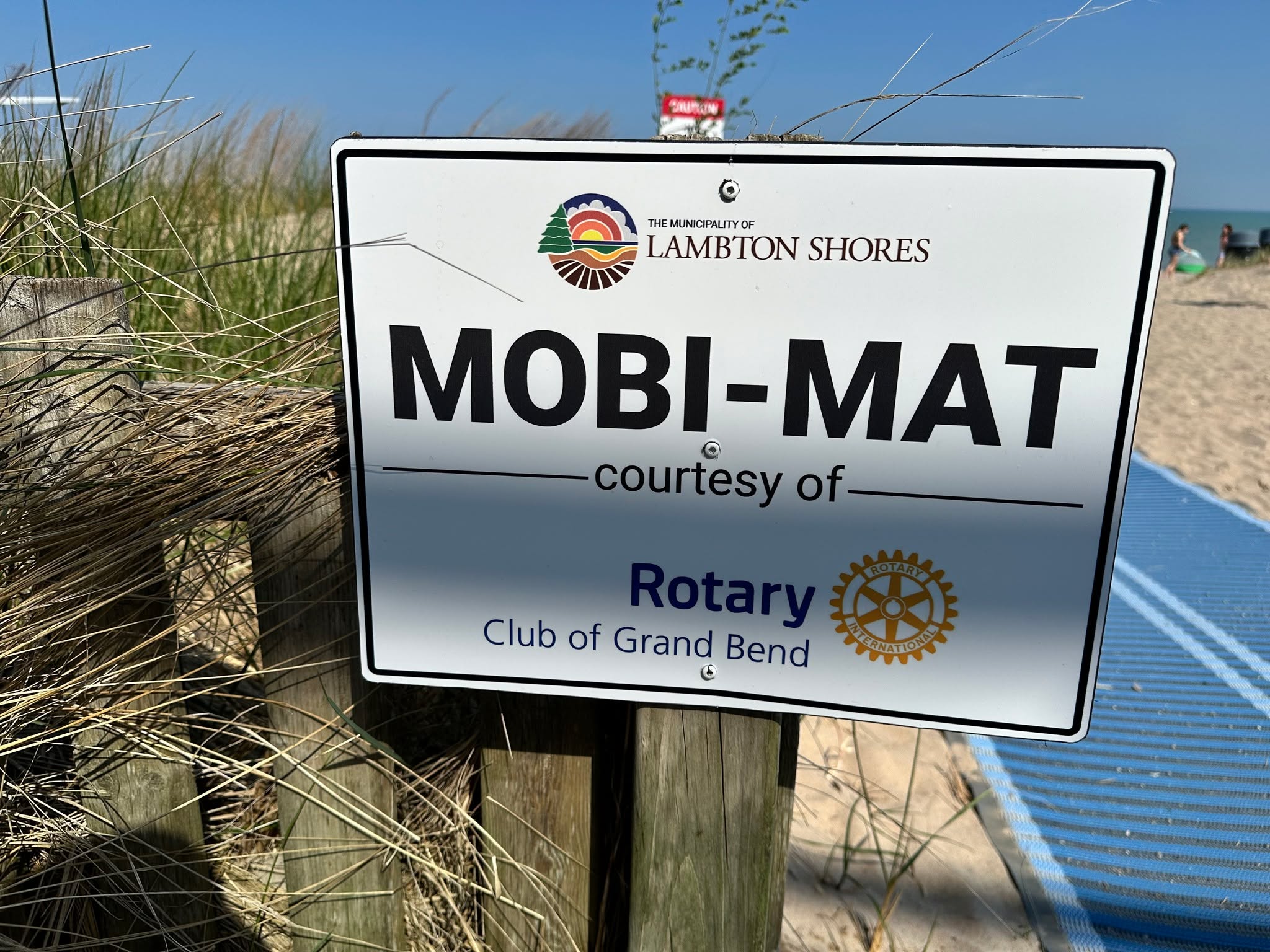 Have you noticed the new Mobi-Mat signage at the main beach? This important addition was made possible through support from Corona Canada’s Accessing Paradise program, the Rotary Club of Grand Bend, and the Municipality of Lambton Shores