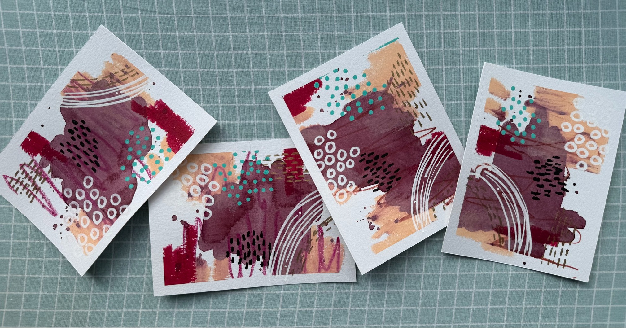 : Four little messes… love ‘em or leave ‘em There’s a lot I don’t love about these abstract minis I made at last week’s Studio Tuesday. But there’s also a lot I do… like the subtle gold dashed lines, the turquoise dots, the white circles—apologies for anyone with trypophobia—and the creamy smears made by tempera paint sticks. Recipients of my May 31st Sunday Sparks ✨ email were invited to claim one of these minis—first come, first served. They were all spoken for within 30 minutes!Which one would you have picked? 1, 2, 3, or 4?If you’re not on my mailing list, sign up in bio 👆🏼