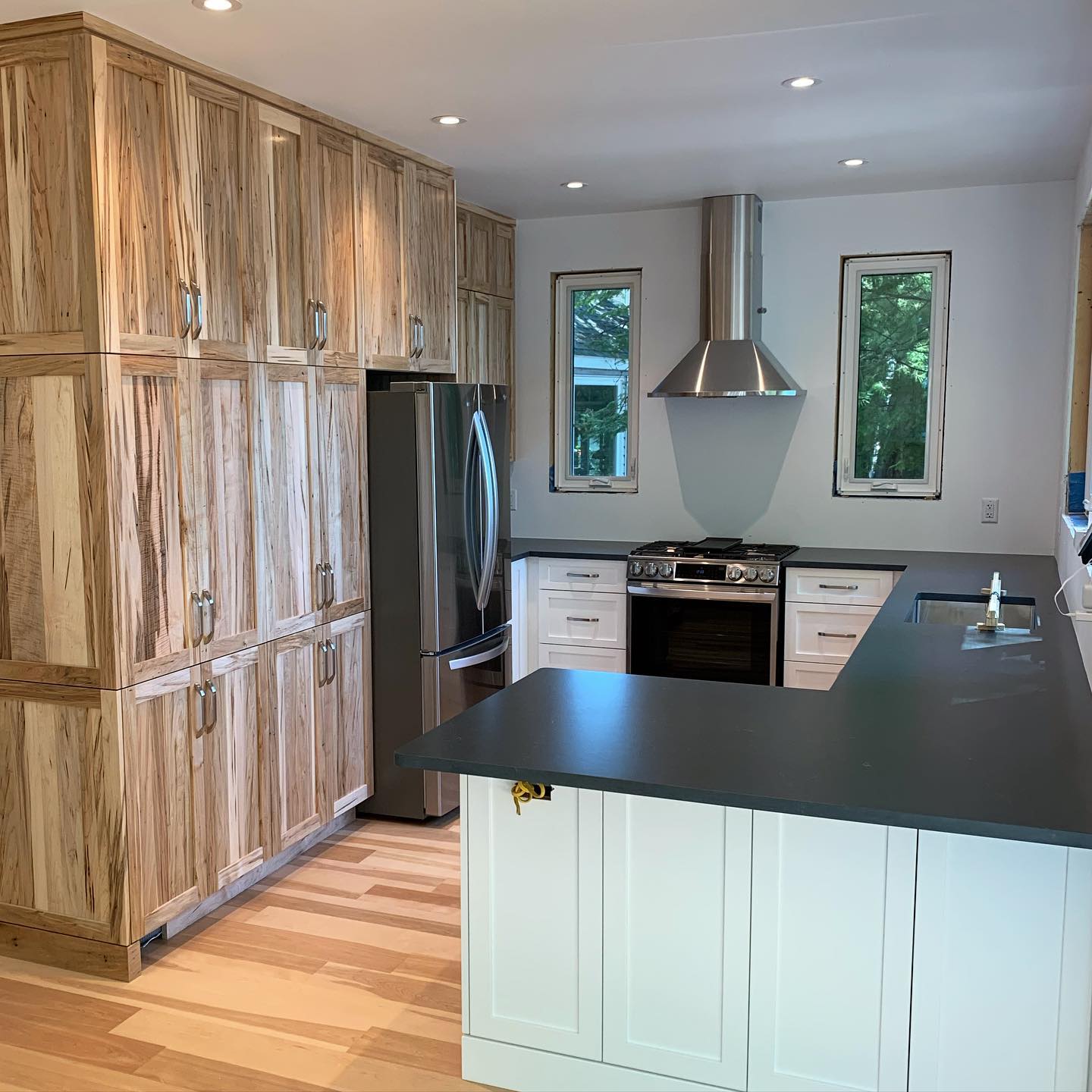 Door Style: Shaker
Colour: Satin White & Natural Hickory
Counters: Silestone - Charcoal Soapstone
#kitchendesign #interiordesign #kitchen #homedecor #kitchendecor #design #interior #homedesign #kitchenremodel #kitcheninspiration #kitcheninspo #kitchenrenovation #renovation #interiors #kitchenisland #kitchencabinets #decor #kitchengoals #kitchenideas #kitchensofinstagram #homesweethome #interiordecor #kitchens